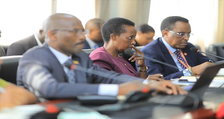 UNRA's Executive Director, Allen Kagina (C) was directed to remove roadside markets and taxi parks that have encroached on the roads